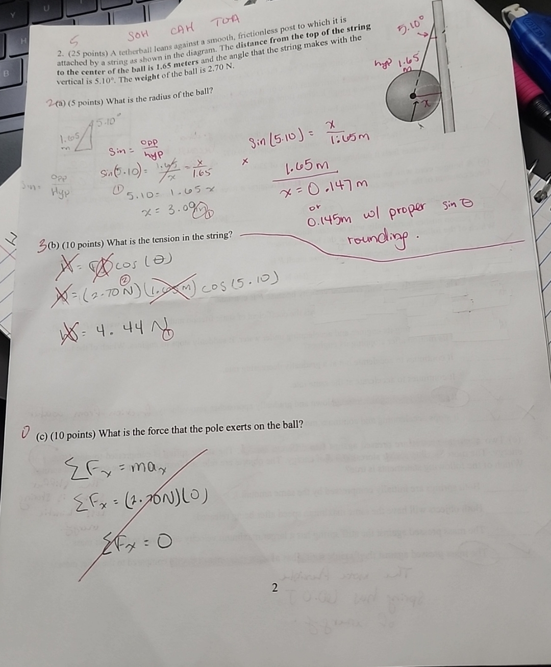Sor attached by a string as shown in the diagram.
