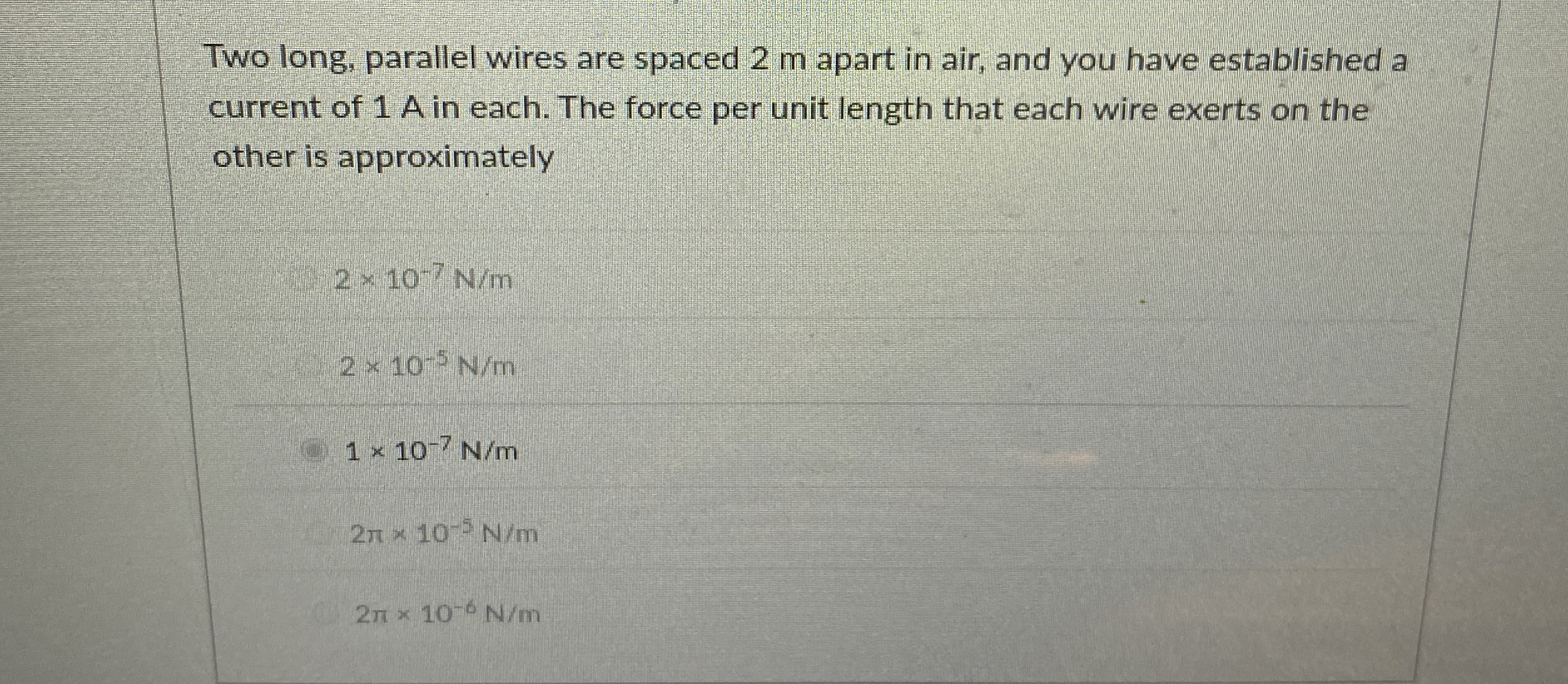 Two long, parallel wires are spaced 2 m apart in