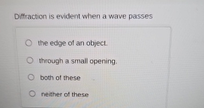 Diffraction is evident when a wave passes the