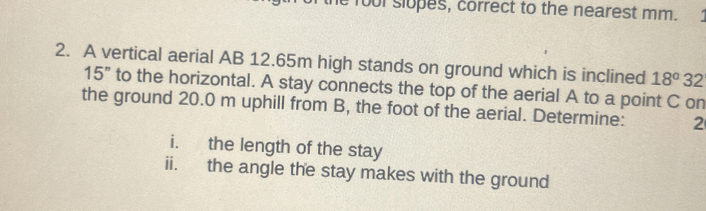 A vertical aerial A B 1 2 . 6 5 m high stands on