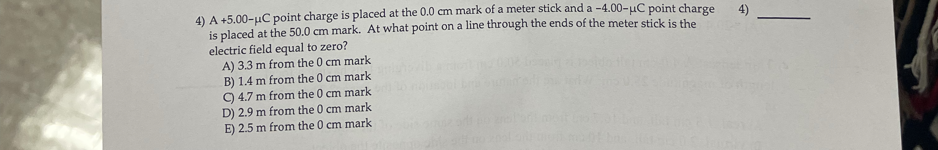 A + 5 . 0 0 - C point charge is placed at the 0 .