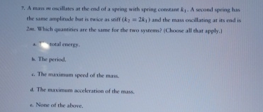 A mass m oxillates at the end of a spring with
