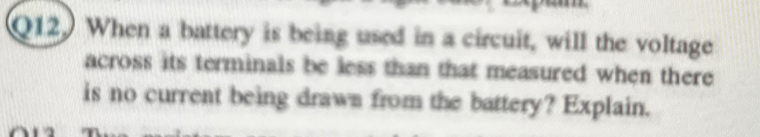Q 1 2 . When a battery is being used in a