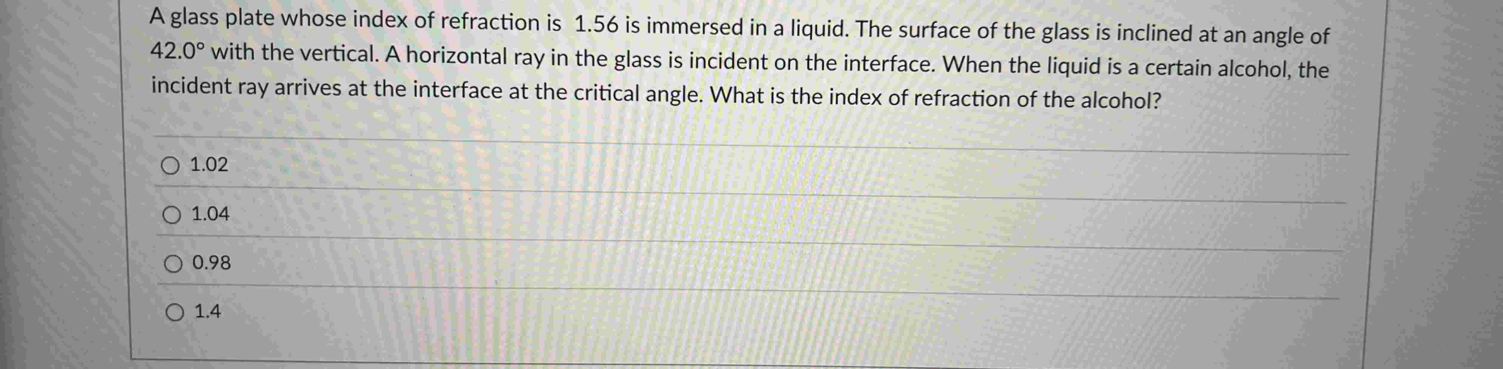 A glass plate whose index of refraction is 1 . 5