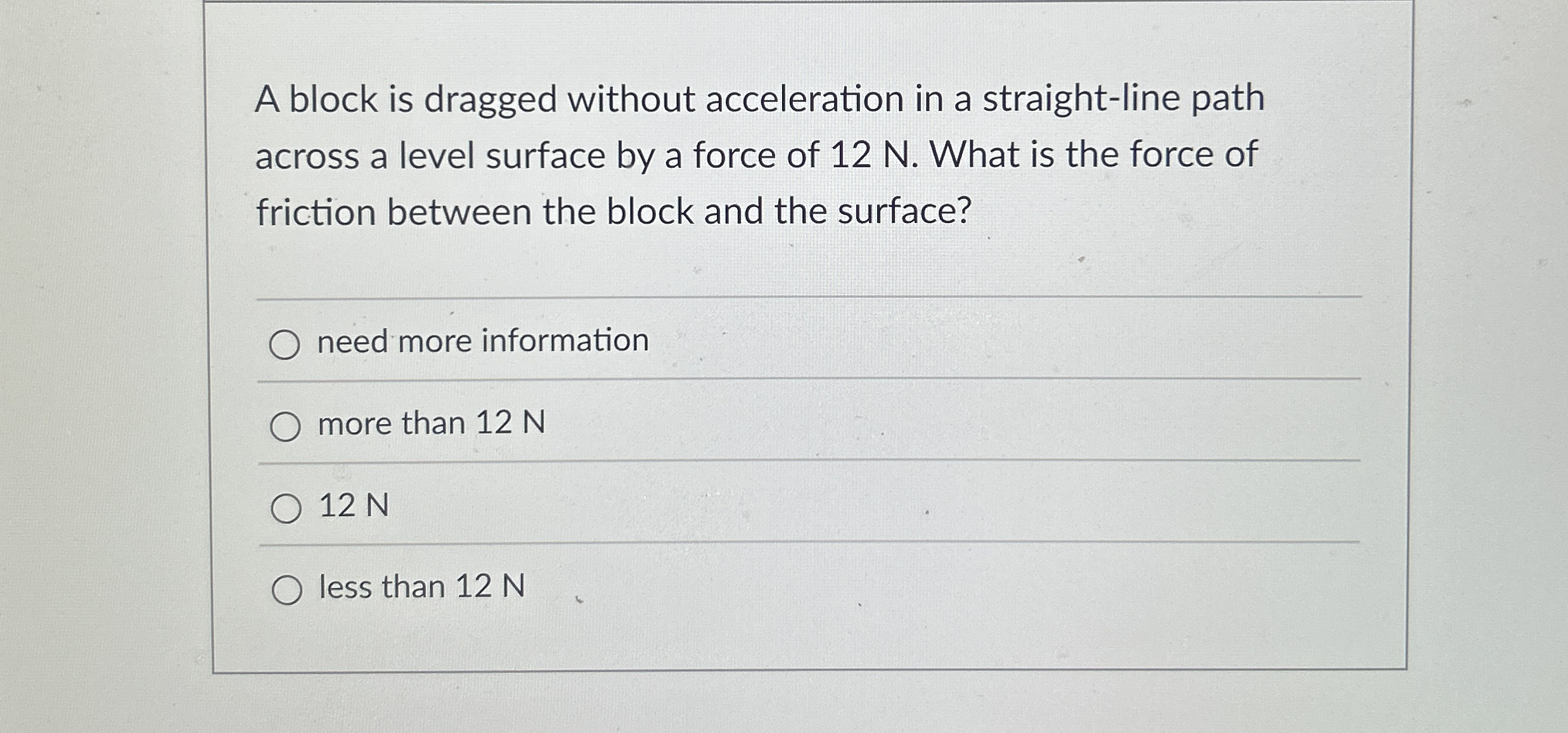 A block is dragged without acceleration in a
