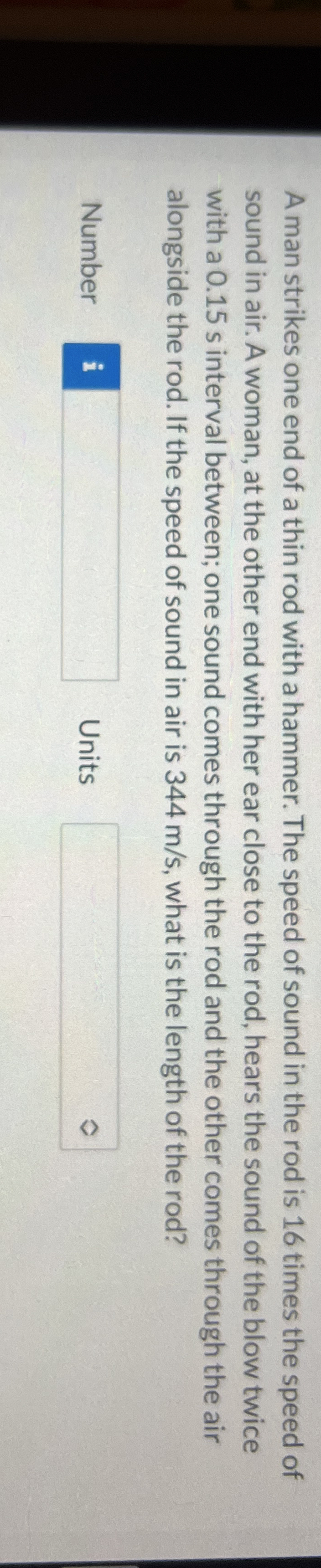 A man strikes one end of a thin rod with a