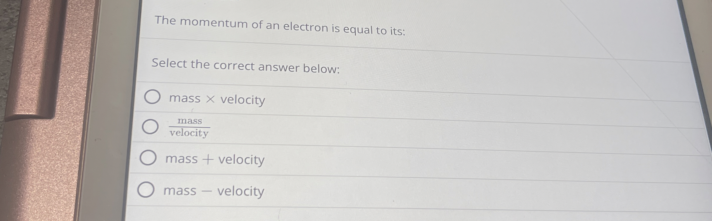 The momentum of an electron is equal to its: