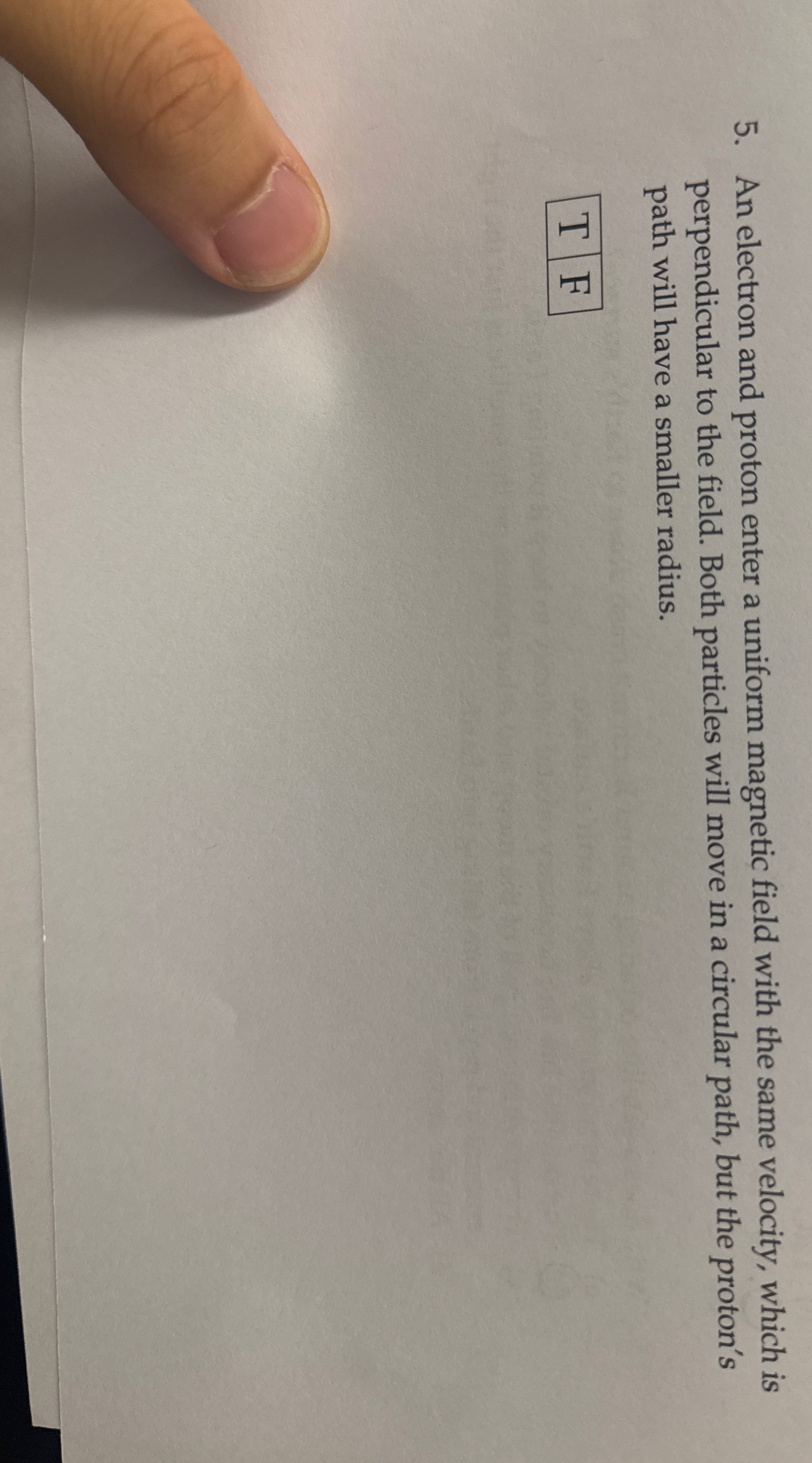 An electron and proton enter a uniform magnetic
