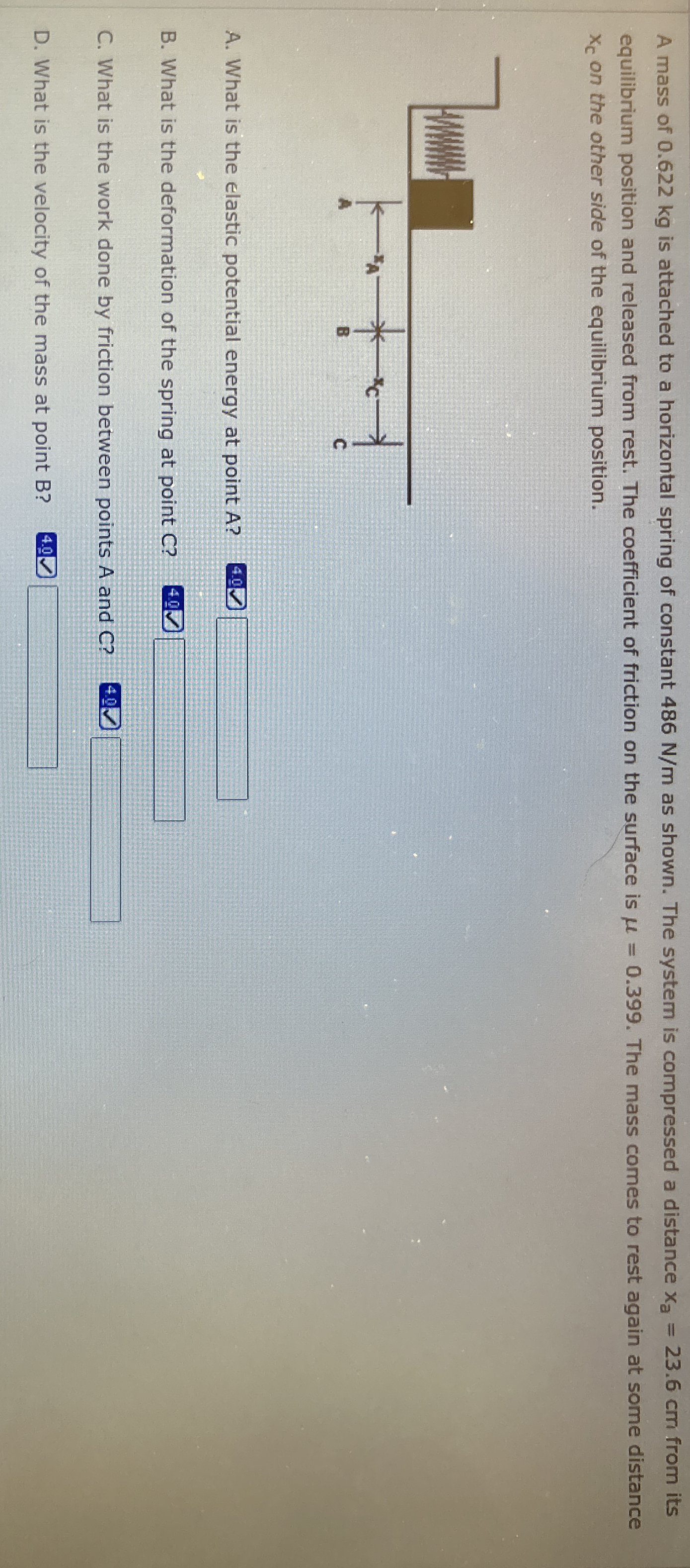 A mass of 0 . 6 2 2 kg is attached to a