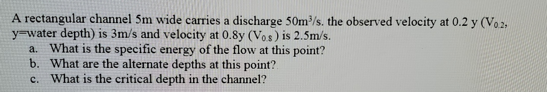 A rectangular channel 5 m wide carries a