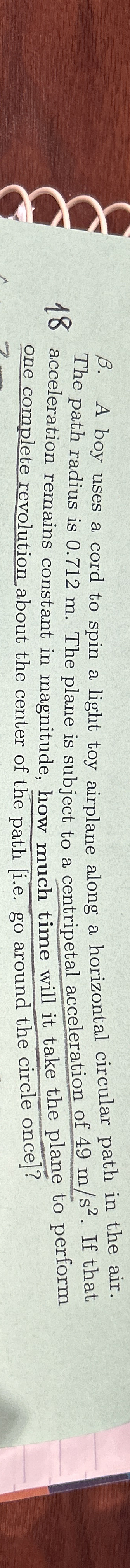 B . A boy uses a cord to spin a light toy