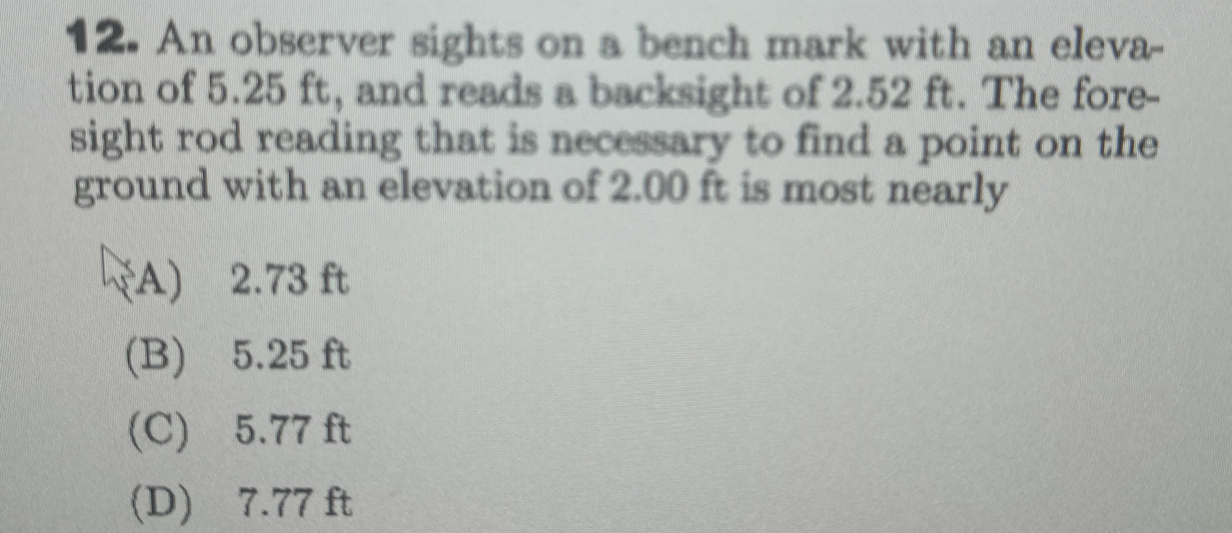 An observer sights on a bench mark with an