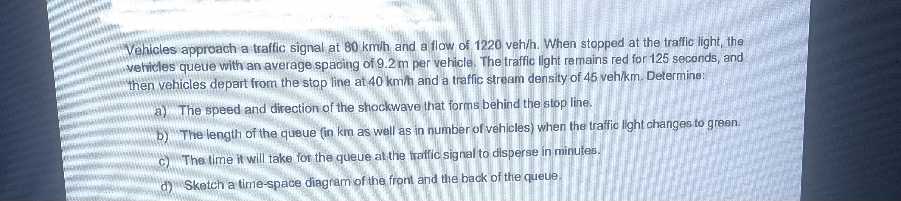 Vehicles approach a traffic signal at 8 0 k m h