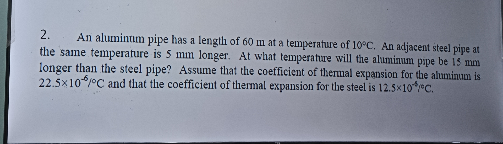 An aluminum pipe has a length of 6 0 m at a