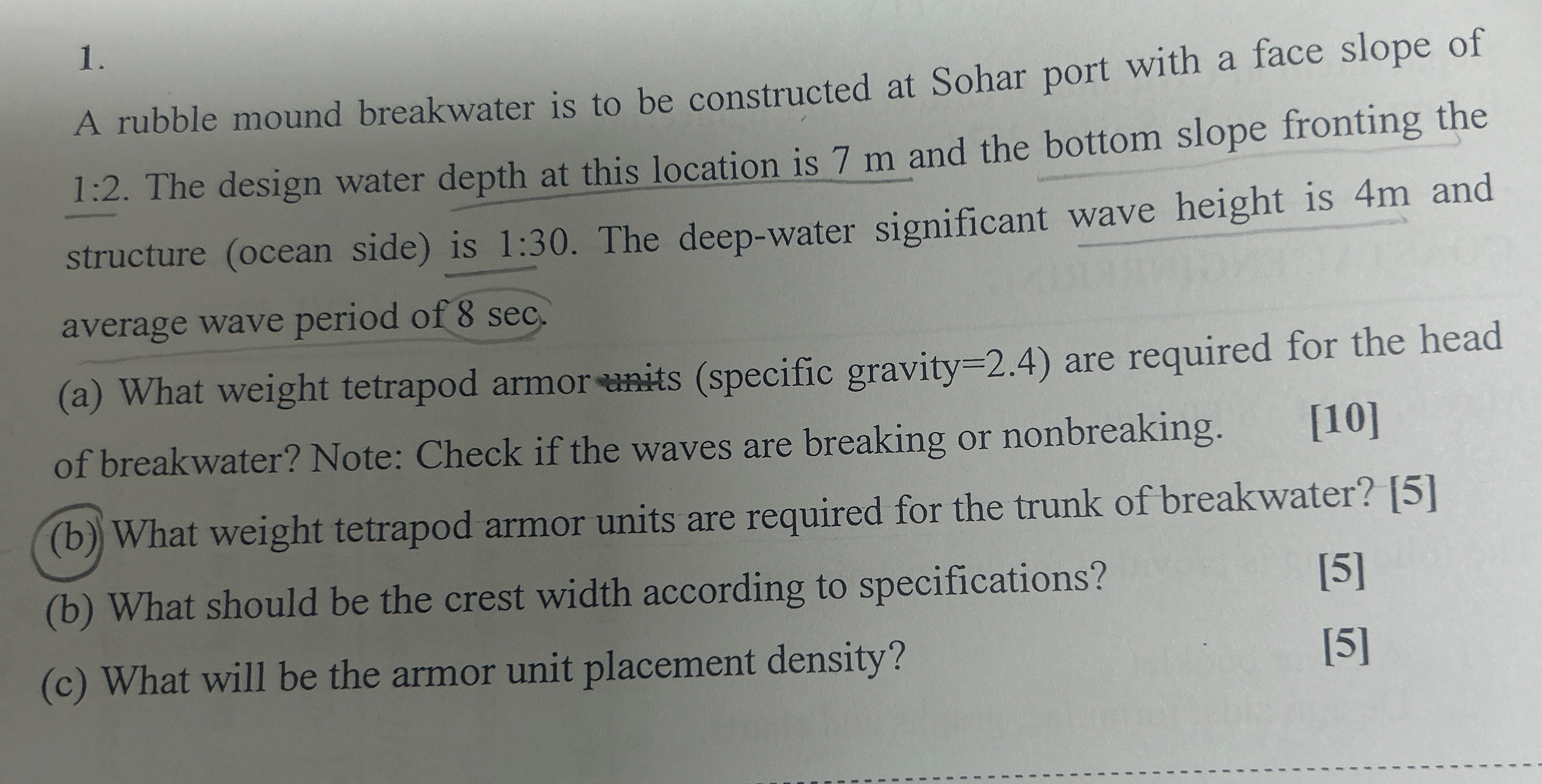 A rubble mound breakwater is to be constructed at
