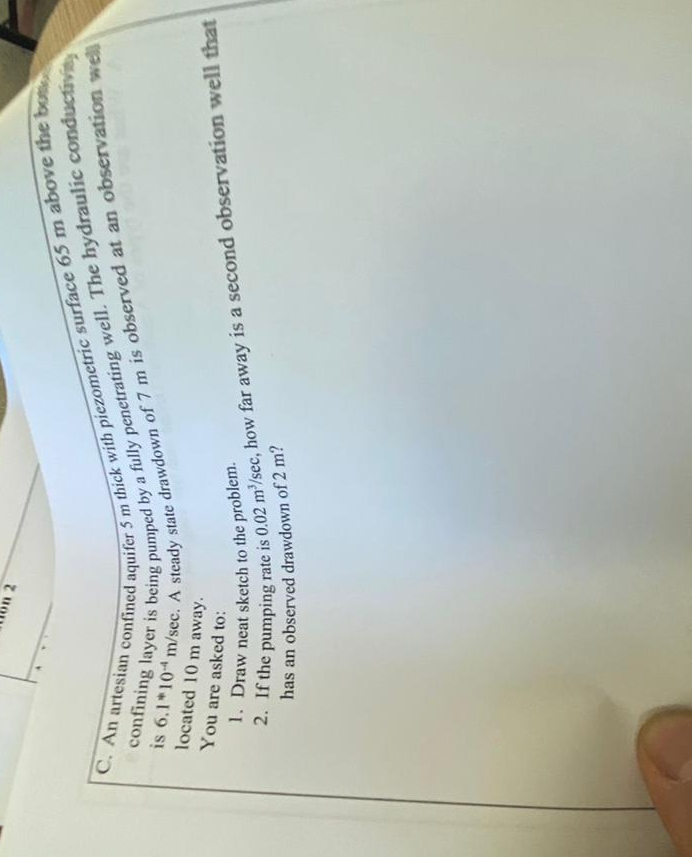 C . An artesian confined aquifer 5 m thick with