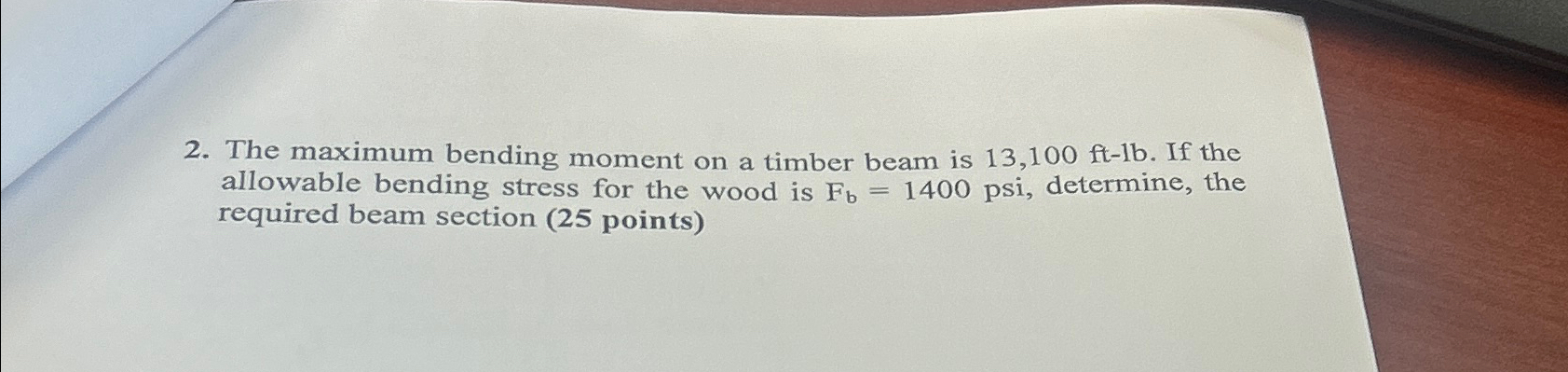The maximum bending moment on a timber beam is 1