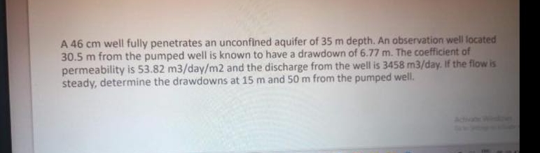 A 4 6 c m well fully penetrates an unconfined