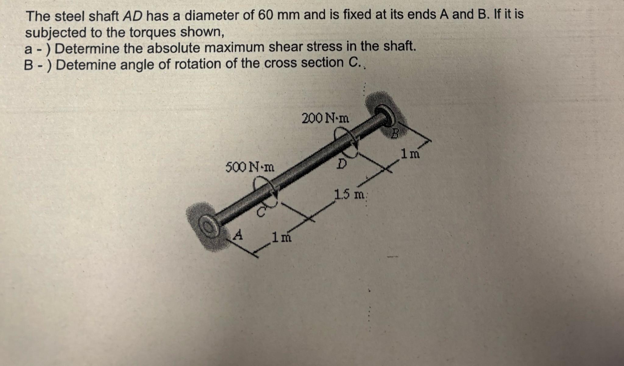 The steel shaft A D has a diameter of 6 0 m m and