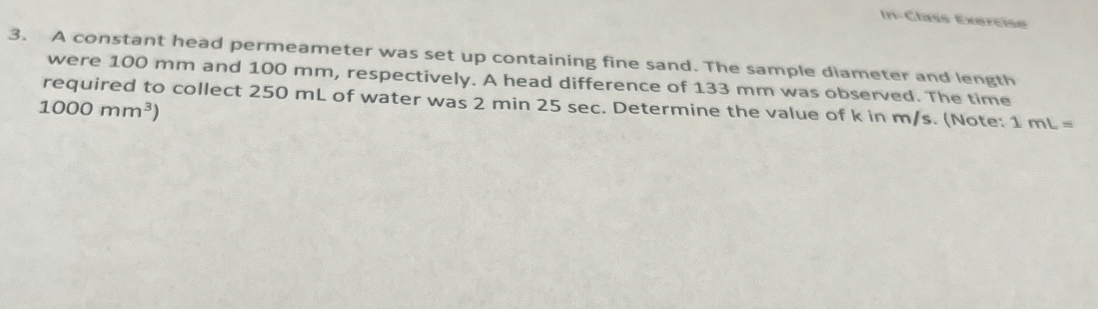 A constant head permeameter was set up containing