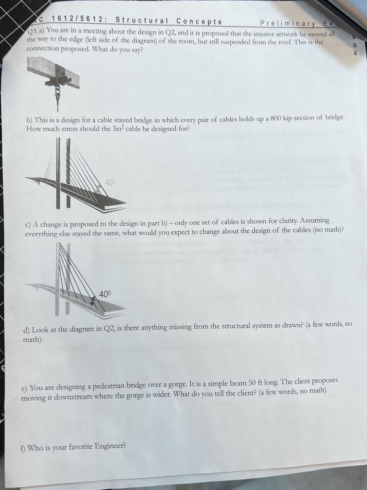 Q 3 . a ) You are in a meeting about the design