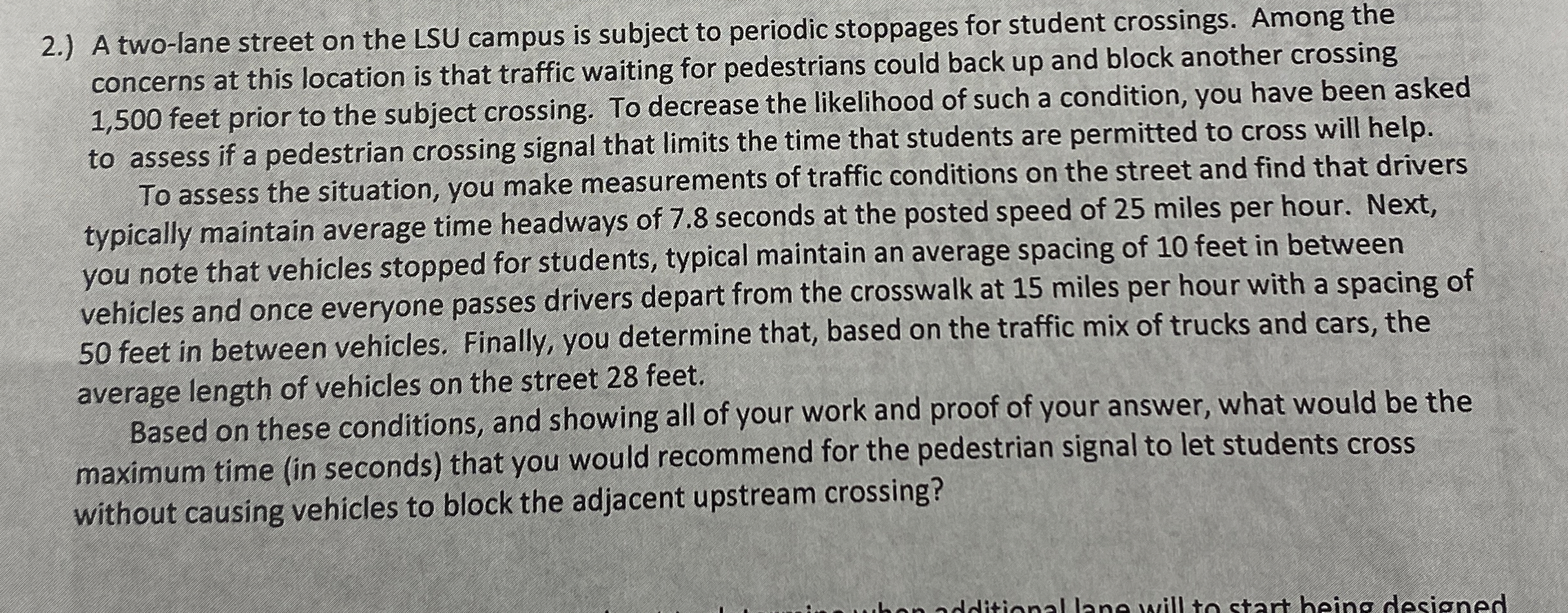 2 . ) A two - lane street on the LSU campus is