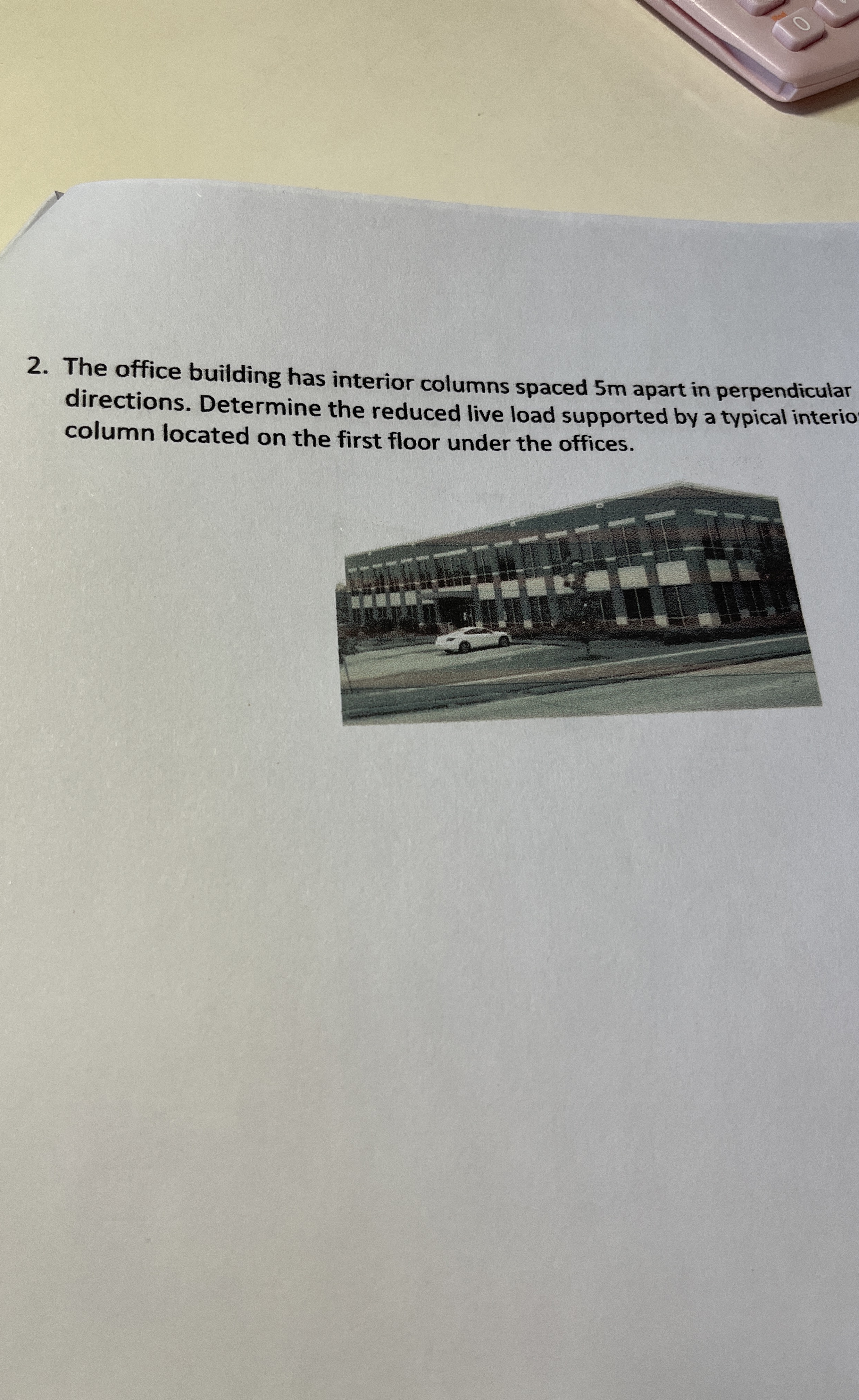 The office building has interior columns spaced 5