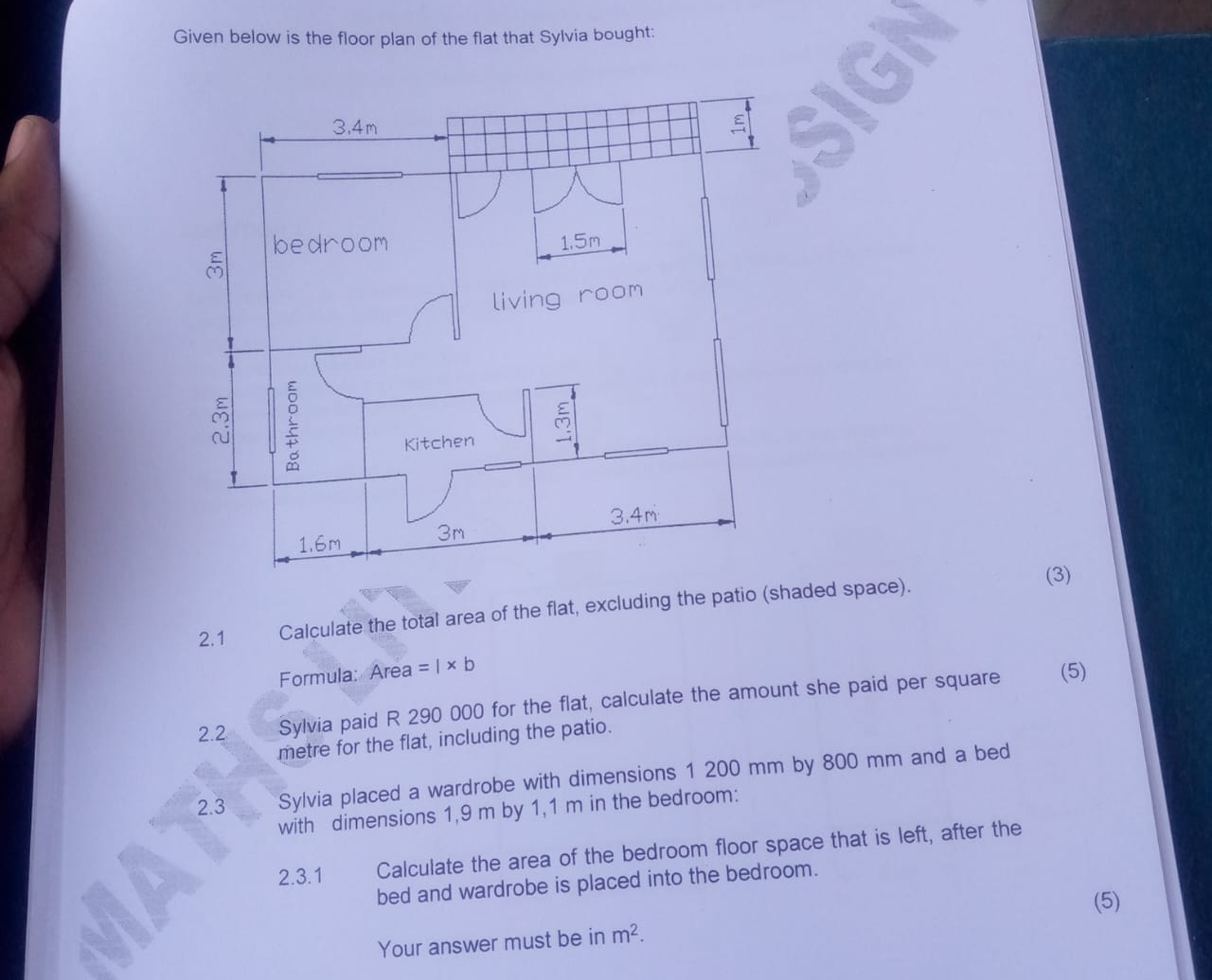 Given below is the floor plan of the flat that