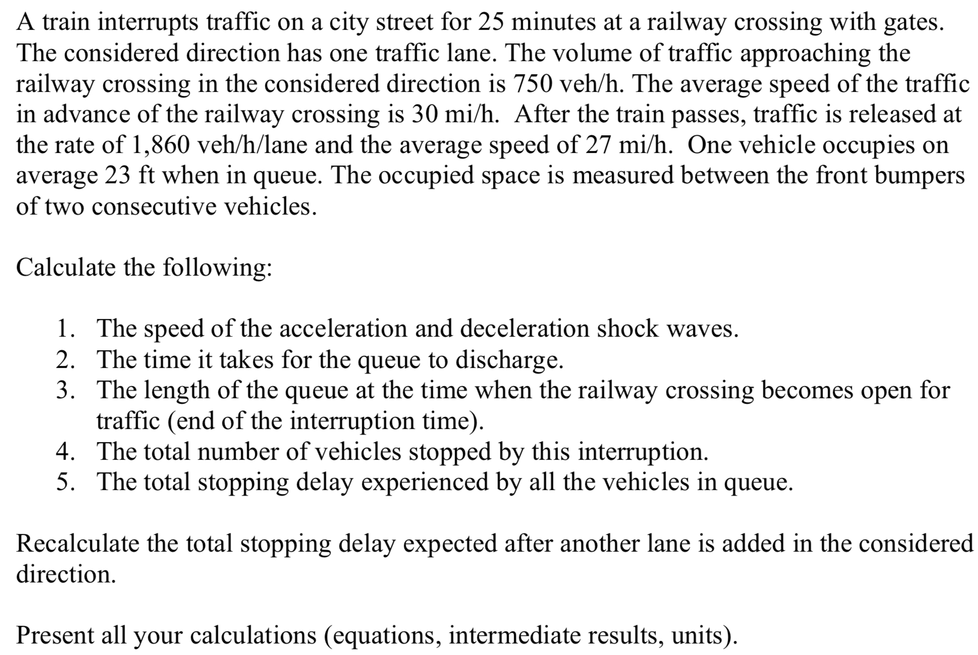 A train interrupts traffic on a city street for 2