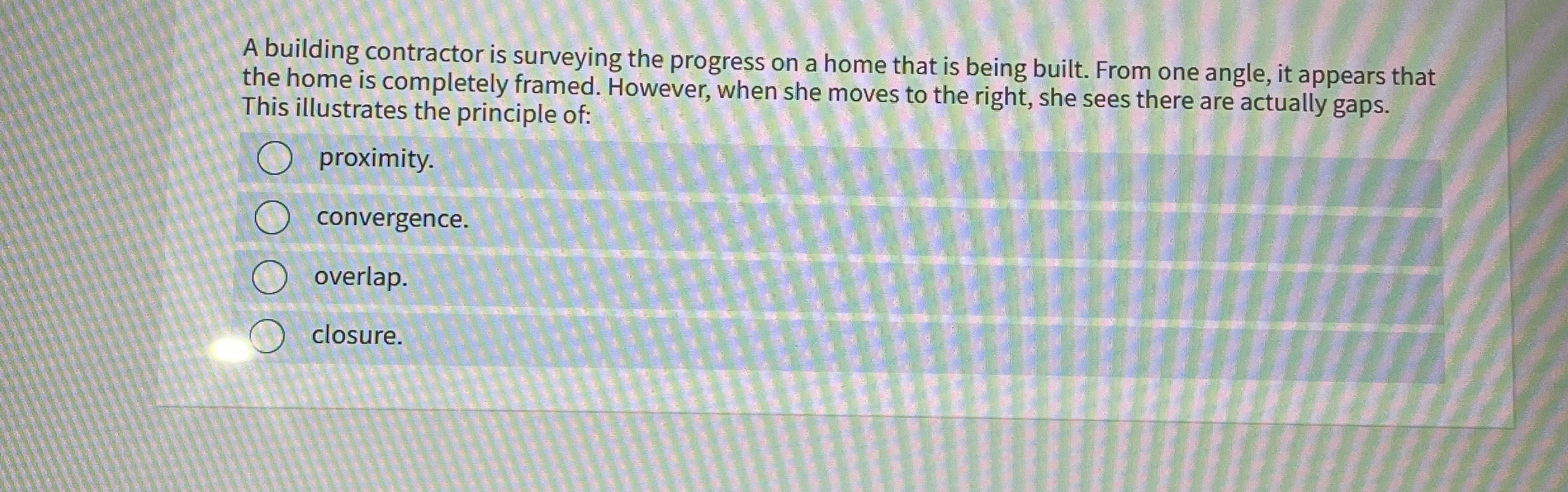 A building contractor is surveying the progress