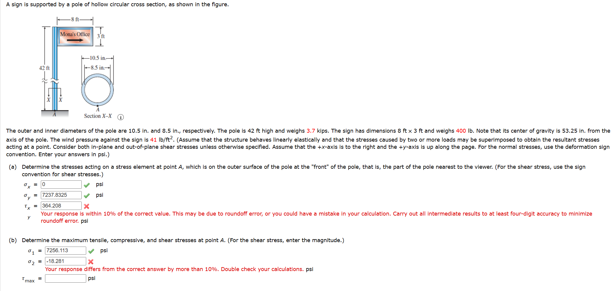 A sign is supported by a pole of hollow circular