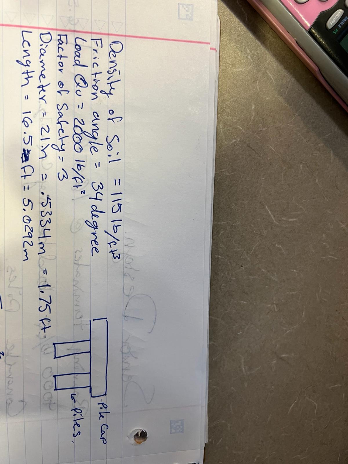 Determine the design load capacity for the piles