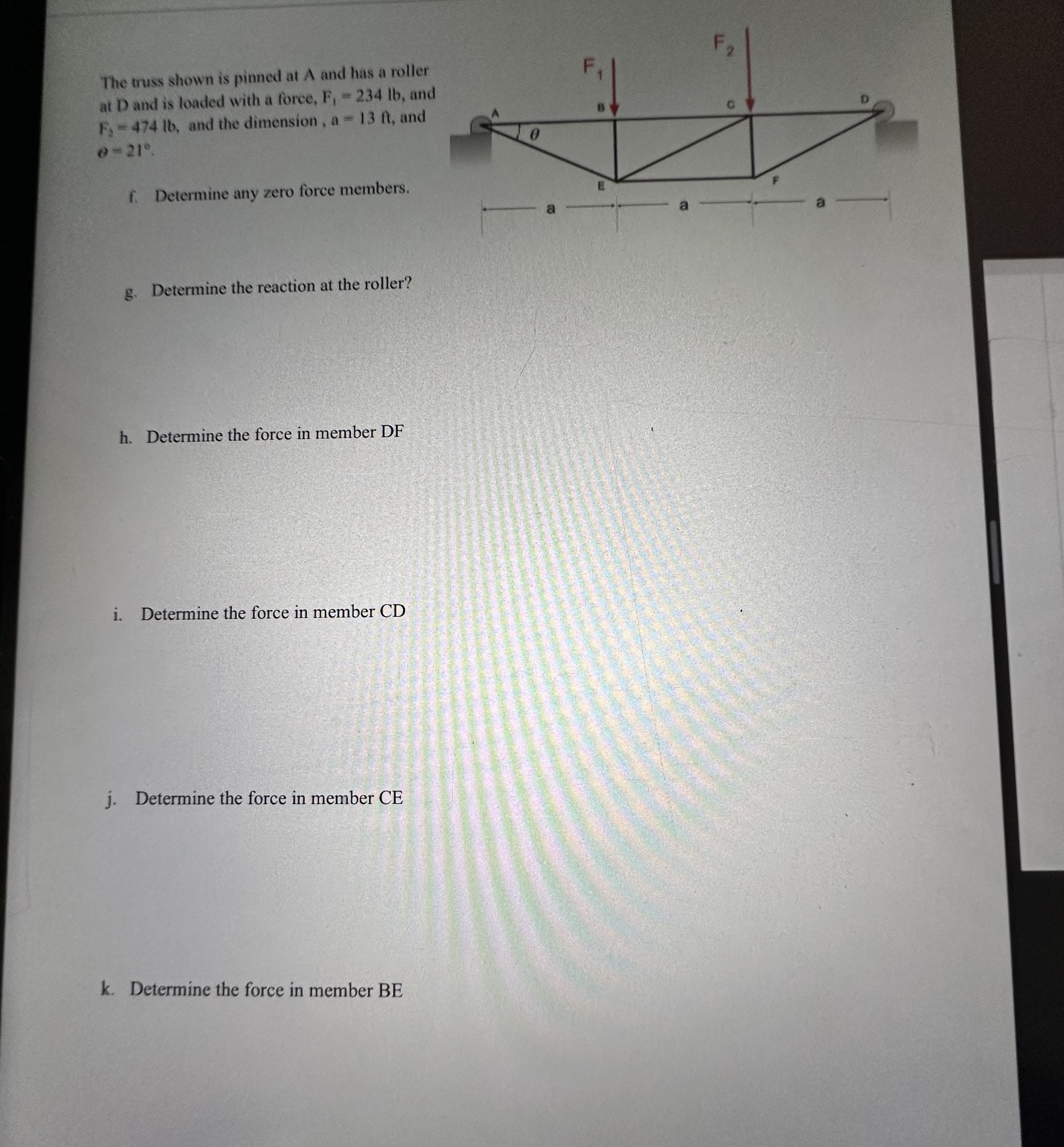 The truss shown is pinned at A and has a roller