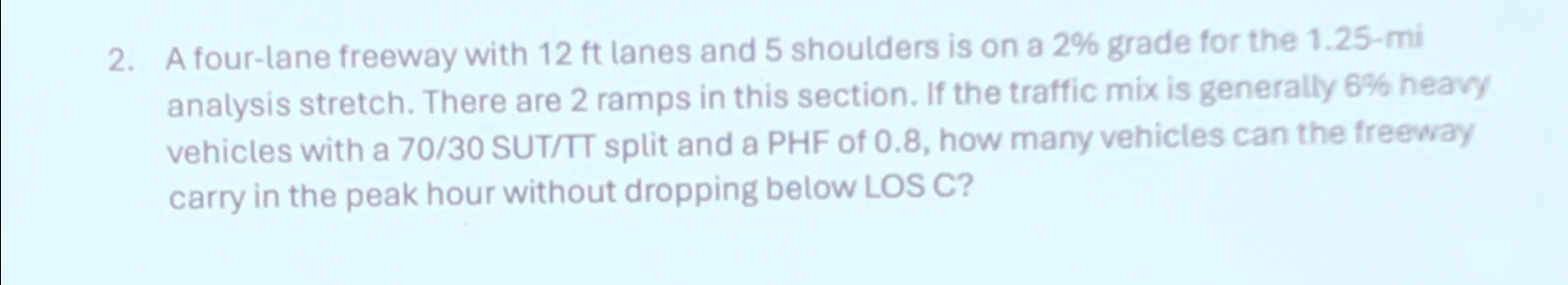 A four - lane freeway with 1 2 f t lanes and 5