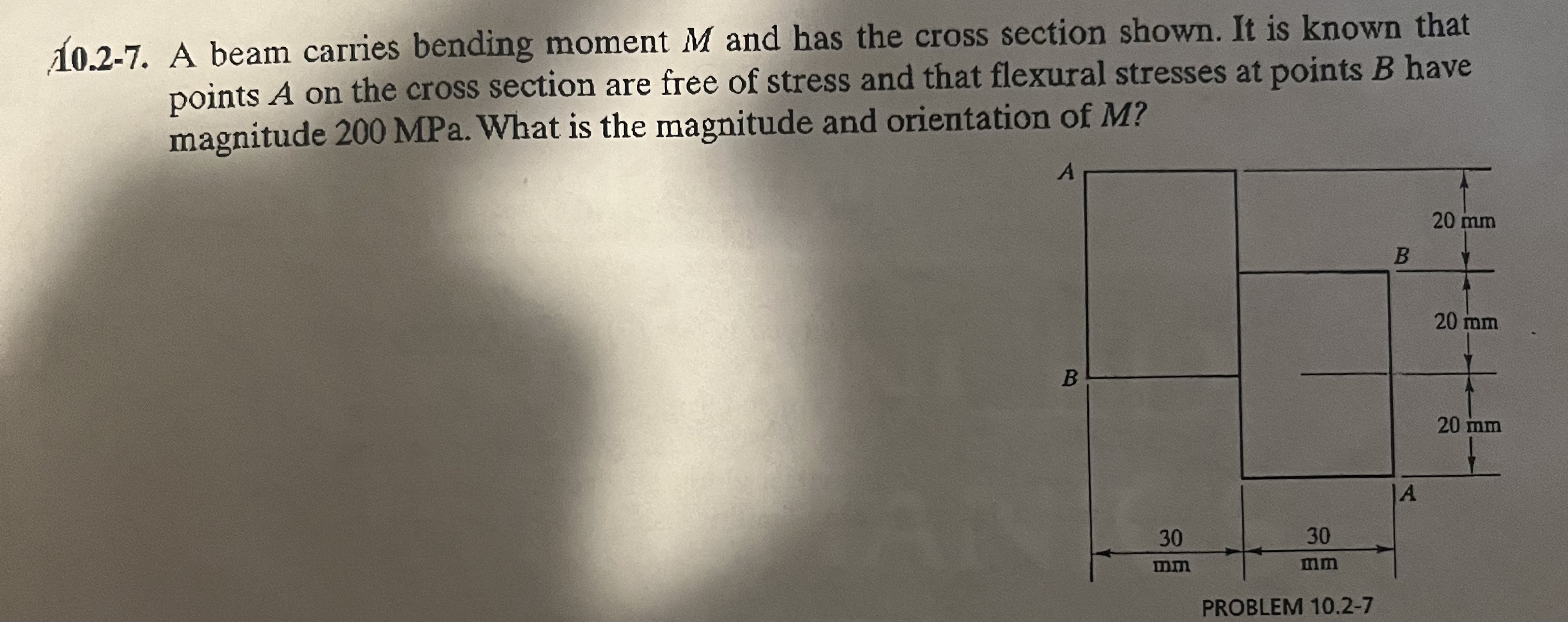 1 0 . 2 - 7 . A beam carries bending moment M and