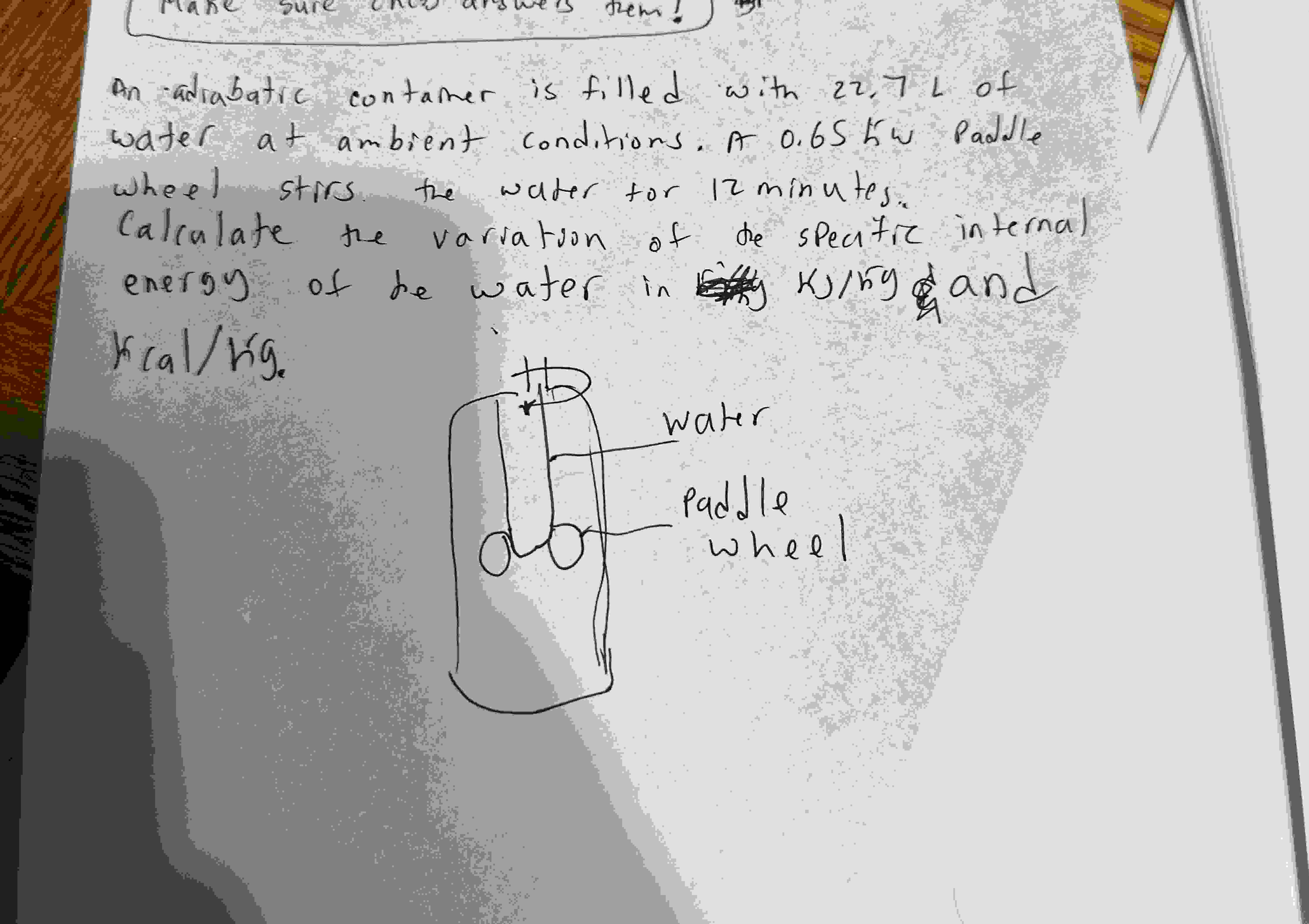 An adrabatic contamer is filled with 2 2 , 7 L of