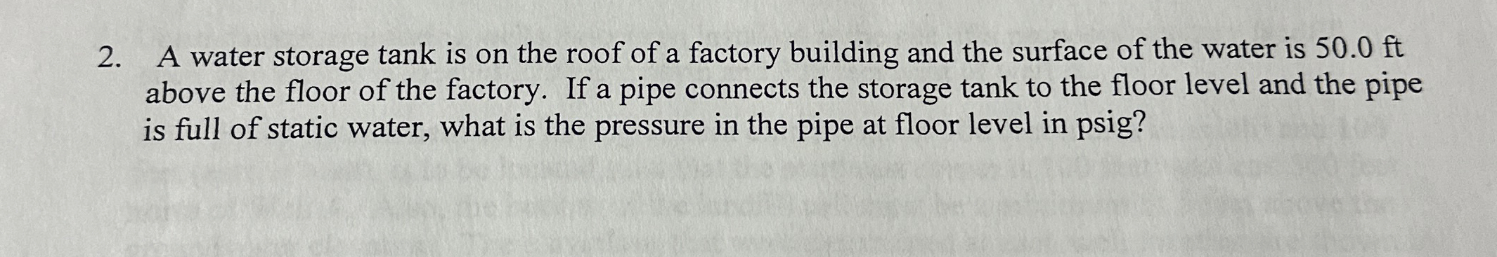 A water storage tank is on the roof of a factory
