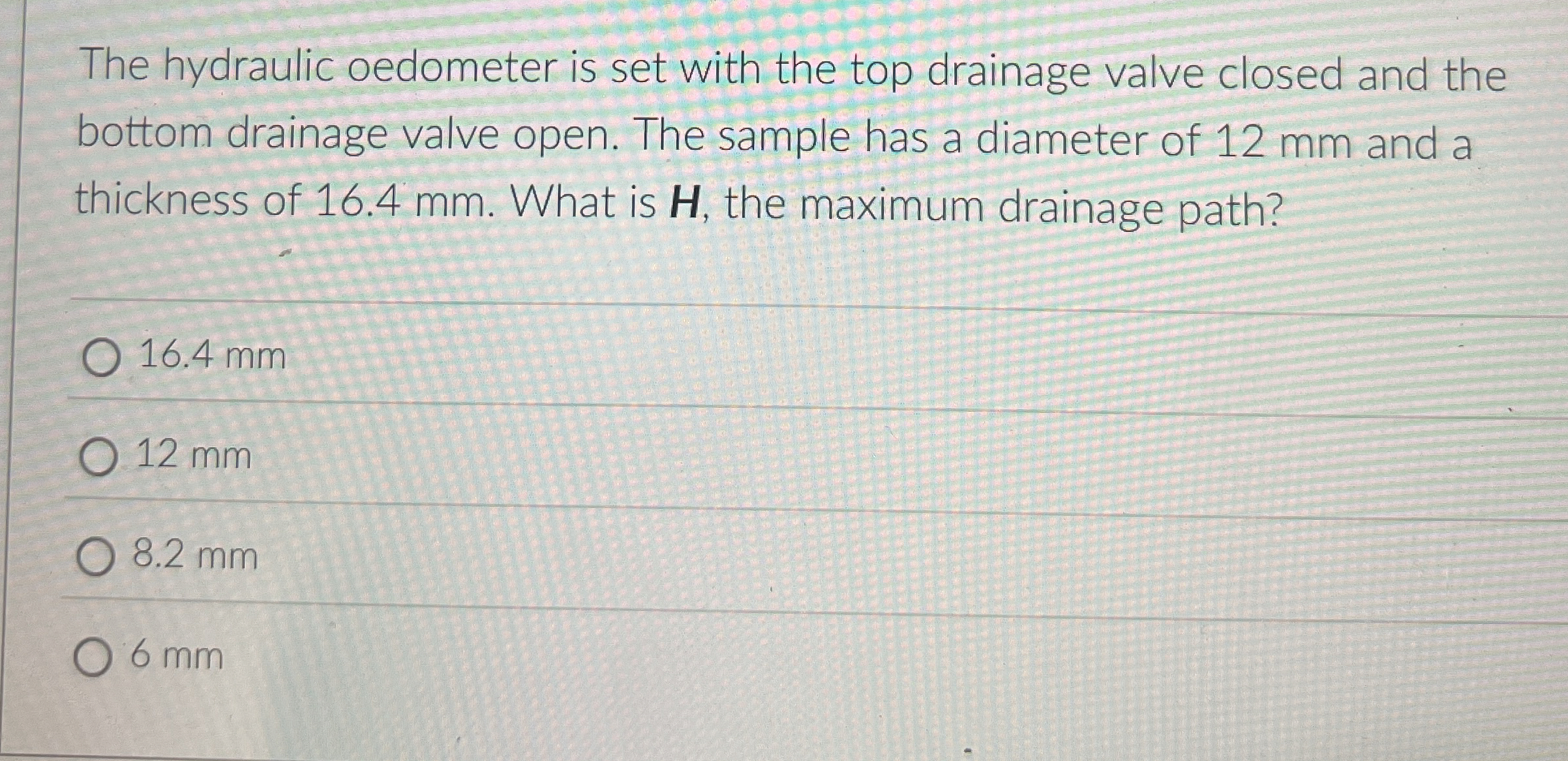 The hydraulic oedometer is set with the top