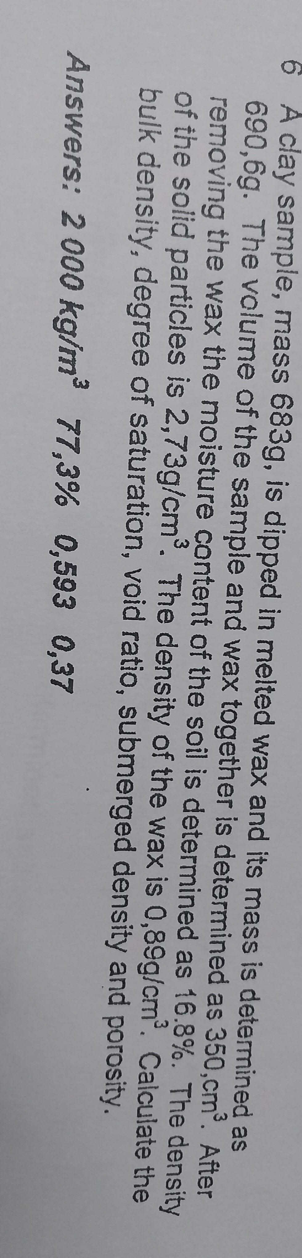 6 A clay sample, mass 6 8 3 g , is dipped in