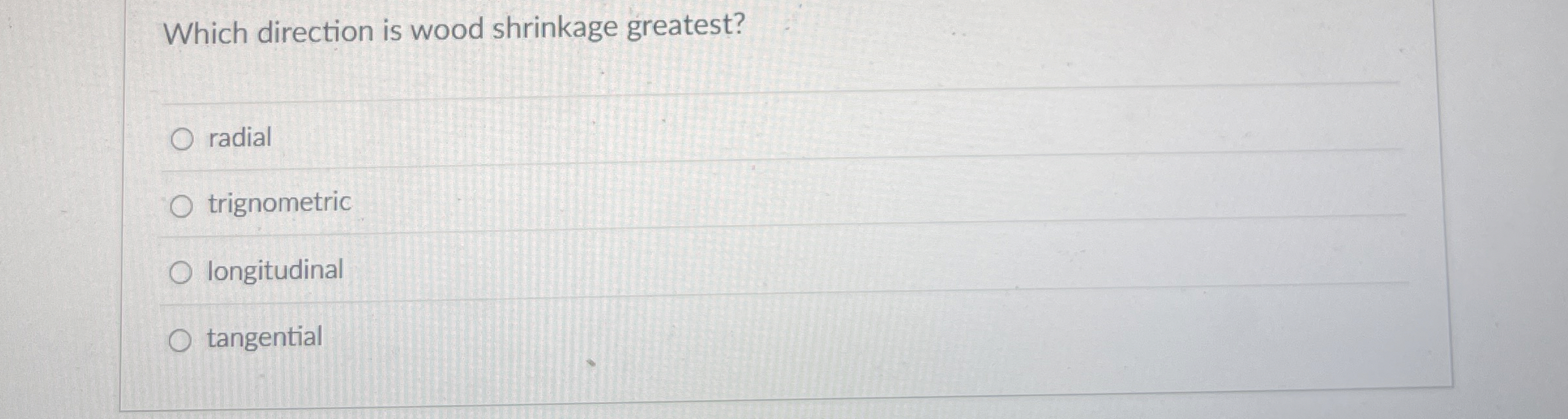 Which direction is wood shrinkage greatest?