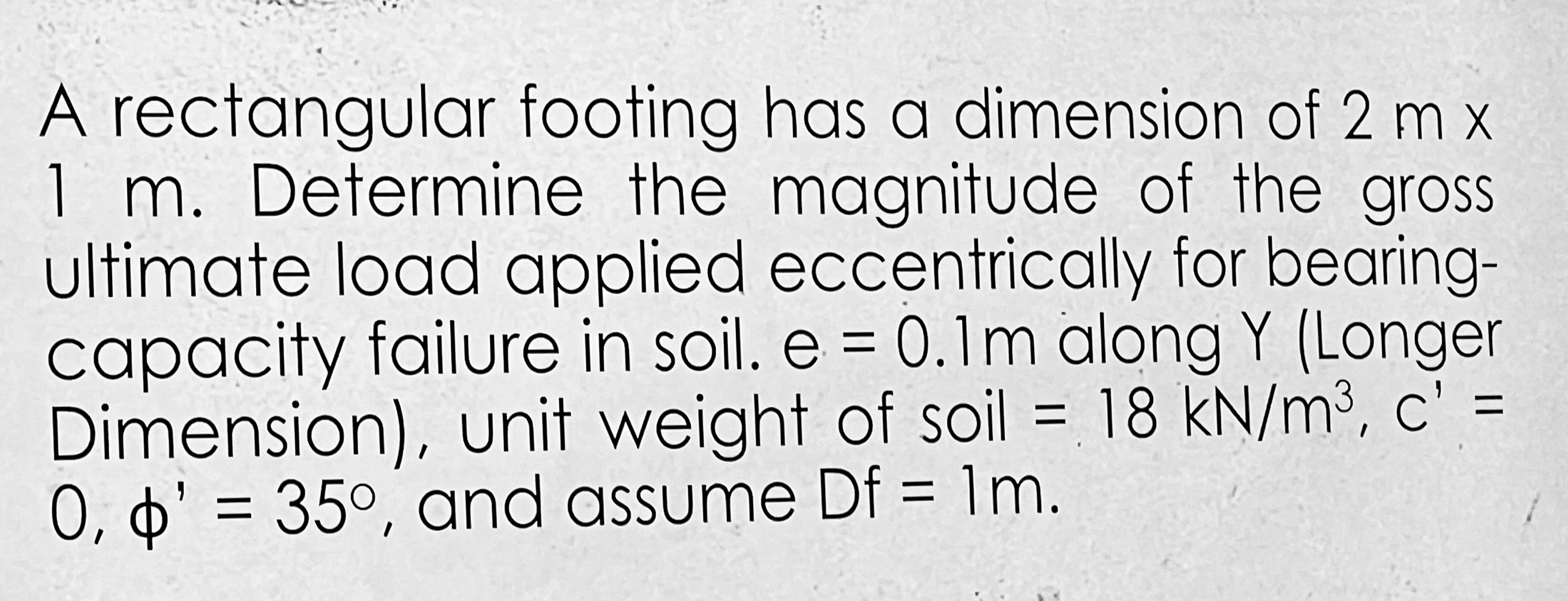 A rectangular footing has a dimension of 2 m x 1