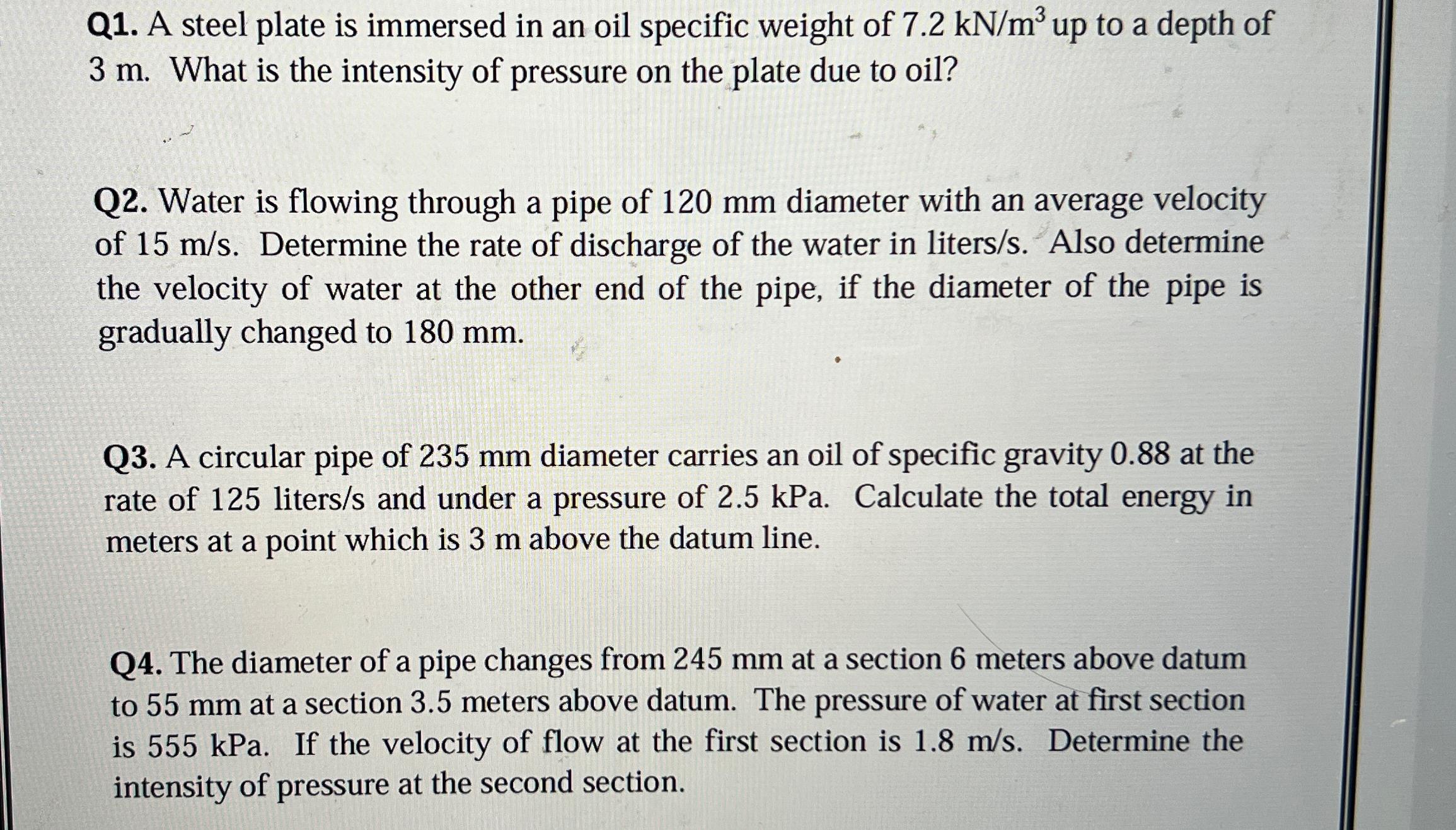Q 1 . A steel plate is immersed in an oil