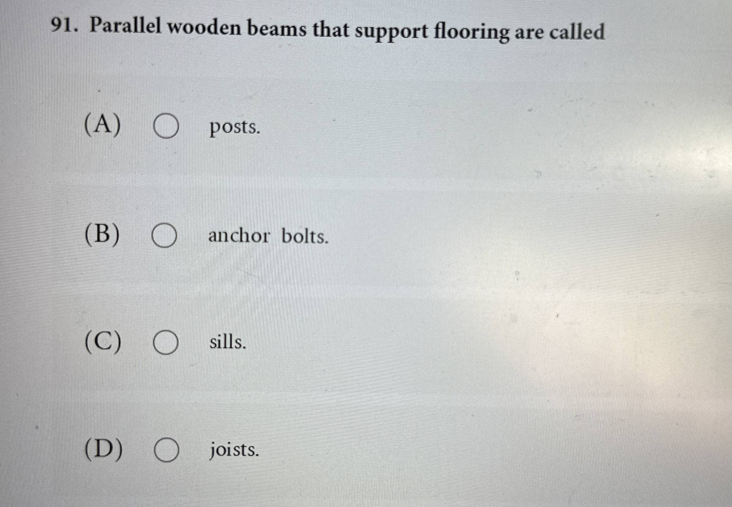 Parallel wooden beams that support flooring are