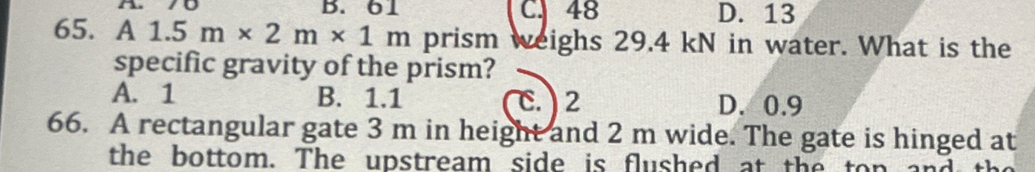 A 1 . 5 m 2 m 1 m prism weighs 2 9 . 4 kN in