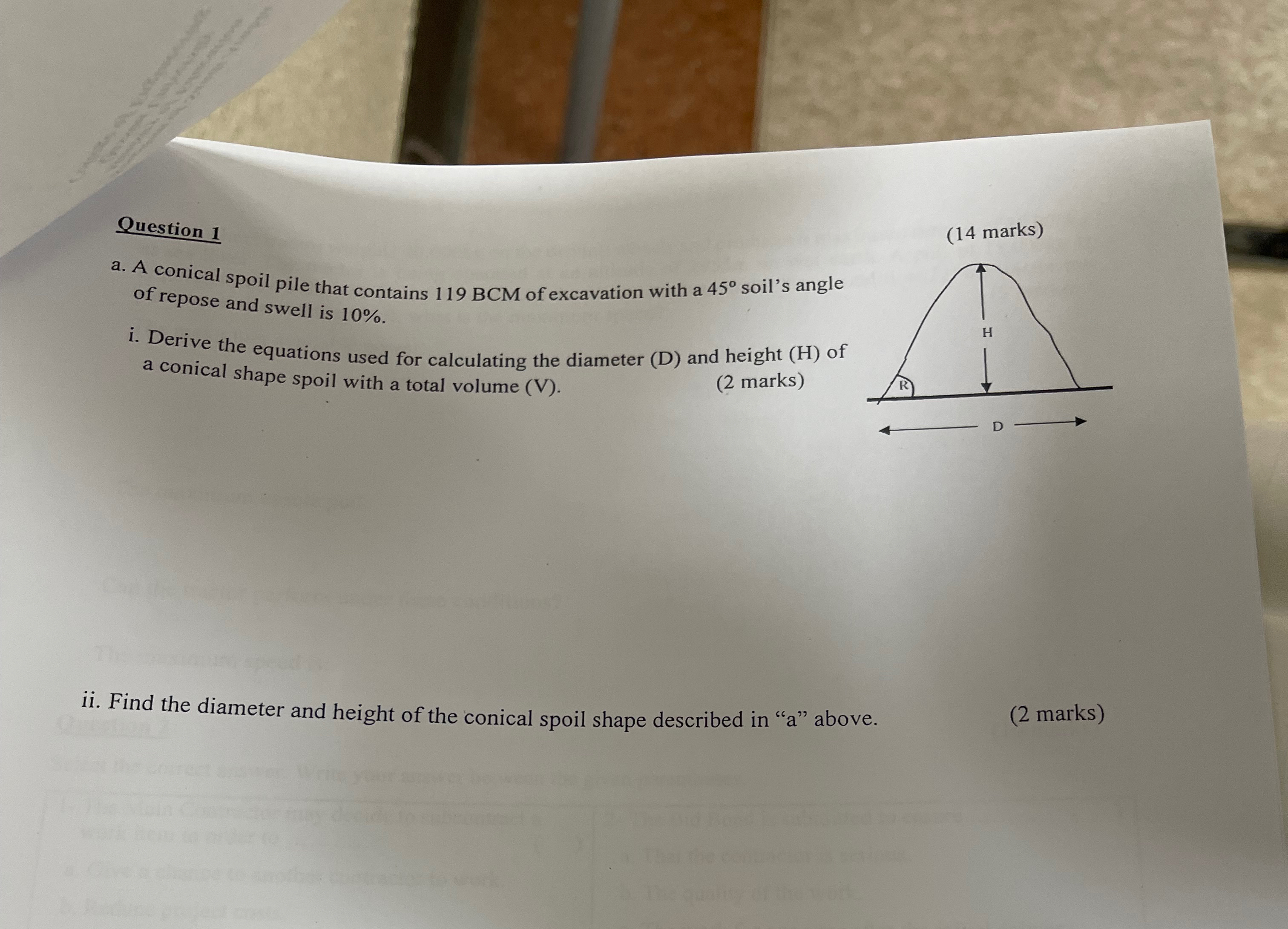 Question 1 a . A conical spoil pile that contains
