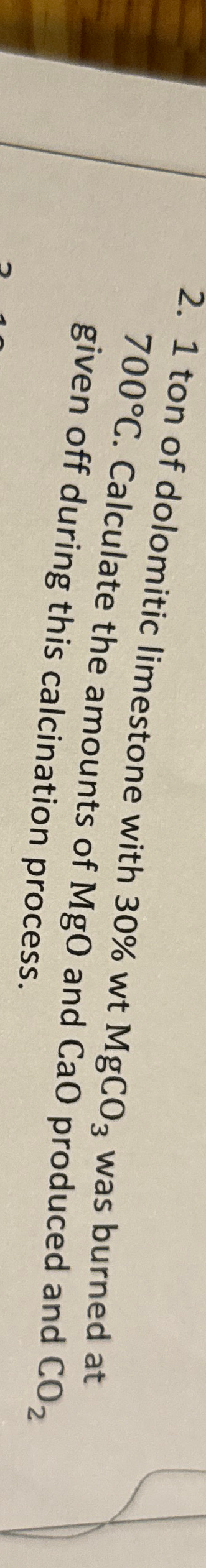 1 ton of dolomitic limestone with 3 0 % wt M g C