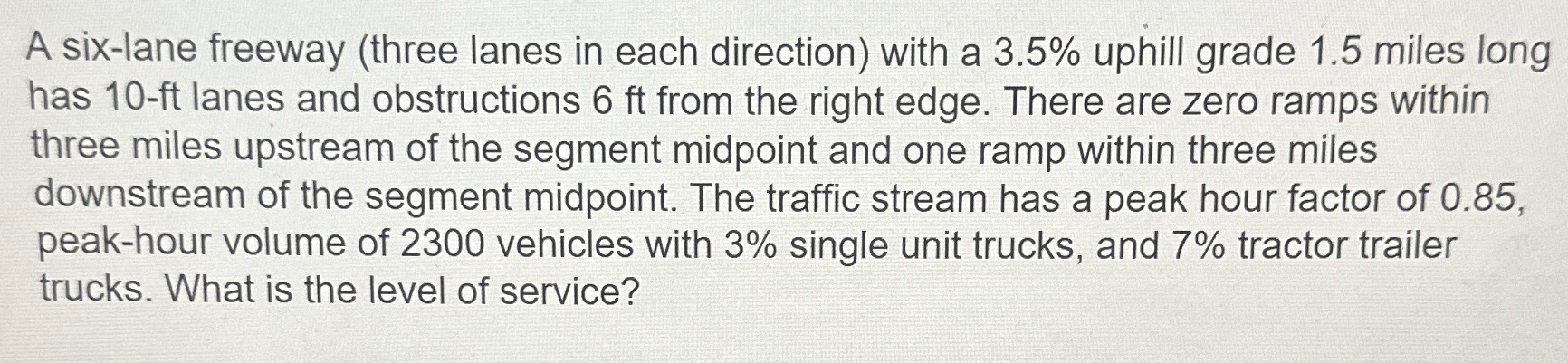 A six - lane freeway ( three lanes in each