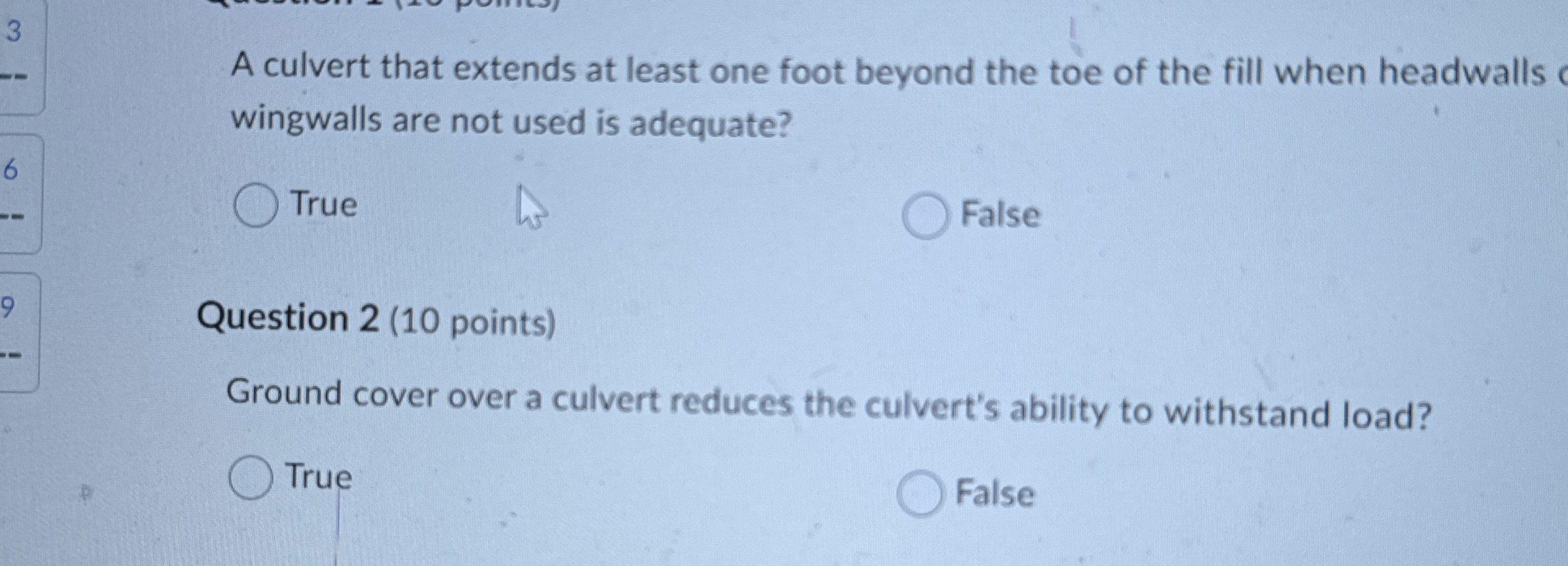 A culvert that extends at least one foot beyond