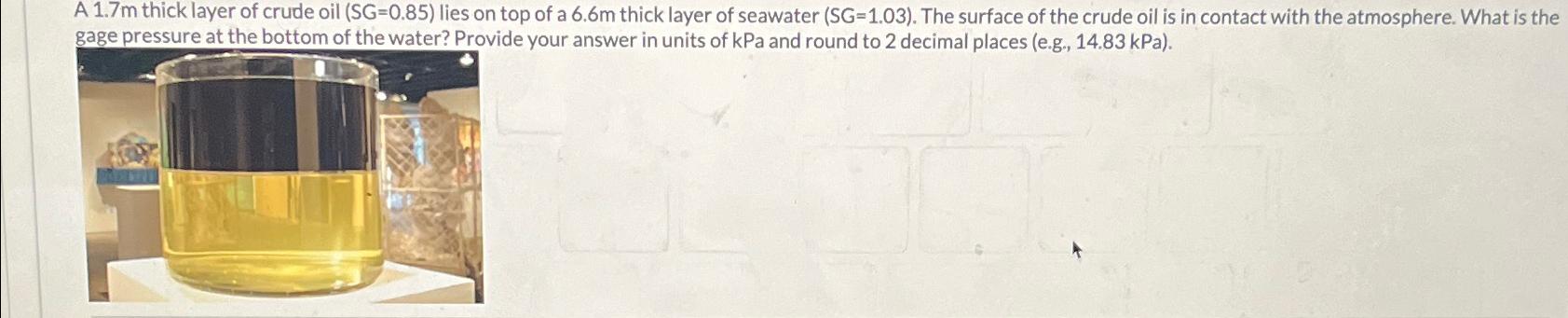 A 1 . 7 m thick layer of crude oil ) = ( 0 . 8 5