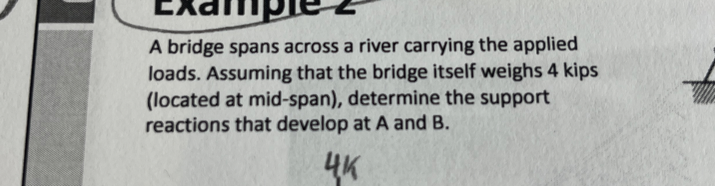 A bridge spans across a river carrying the